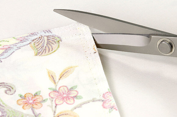 Klippa hörn på kuddfodral