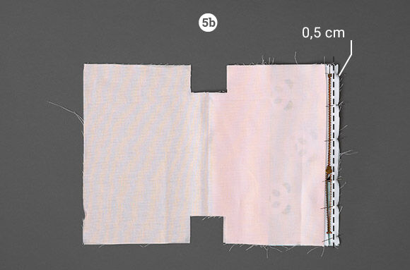 Sy den andra sidan av dragkedjan på yttertyget