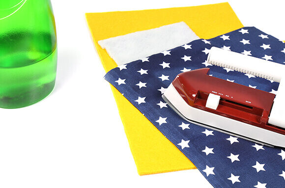 Vlieseline op de hoofdstof strijken