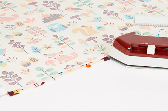 Sy ena sidan av dragkedjan