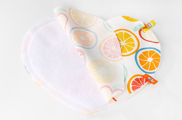 Thermolam en bovenstof vastspelden