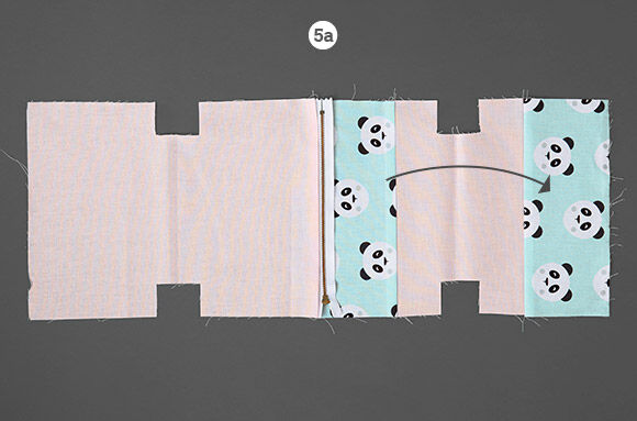 Fästa den andra dragkedjesidan på yttertyget